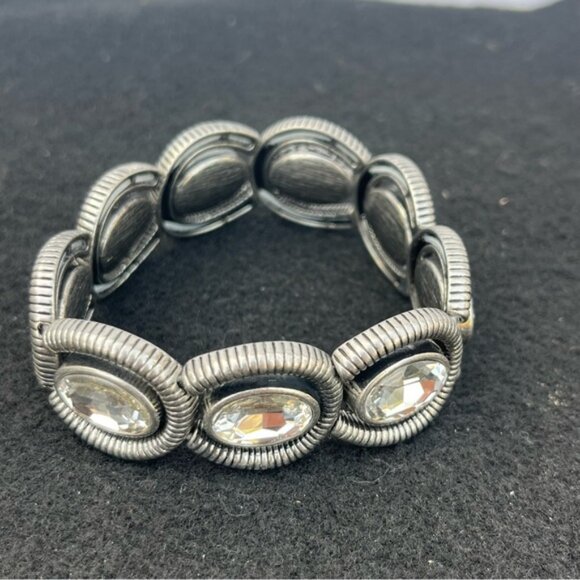 Lia Sophia Coil Clear Cut Crystals Silvertone Stretch Bracelet - Picture 1 of 6